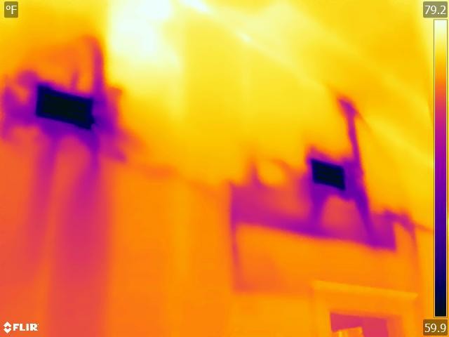 leaking air into an attic from hvac supply boots not being sealed properly. This image was found with a thermal camera in orlando florida